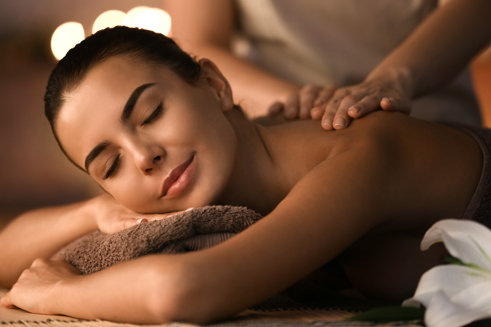 Woman relaxing during a massage therapy session